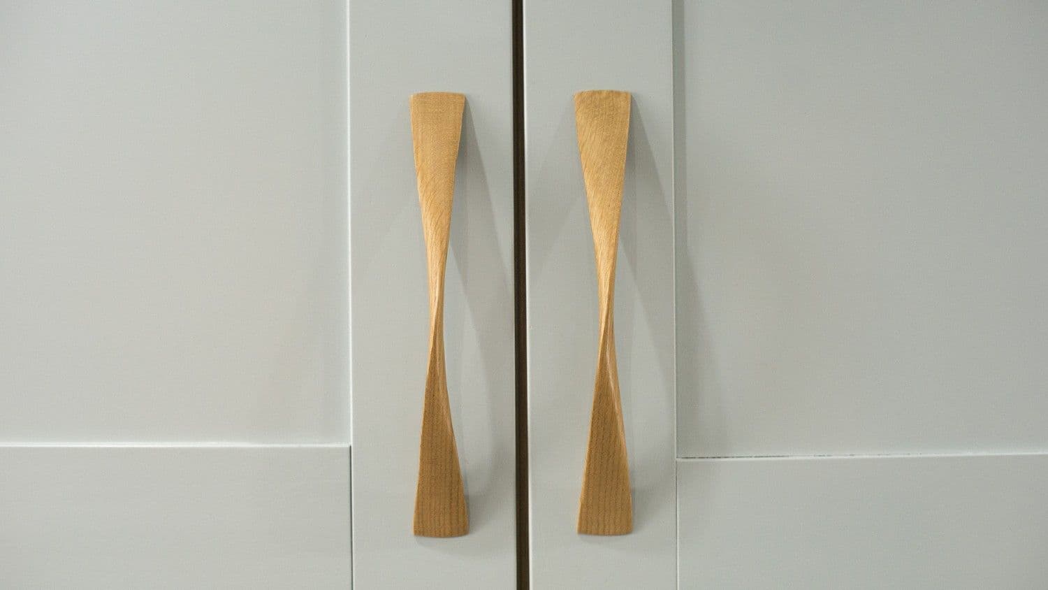 Close up of the unique oak twist kitchen handles.