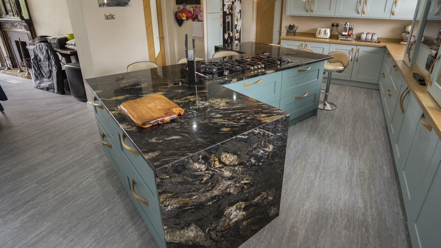 Another view of the stunning marble worktop using on the island of this kitchen.