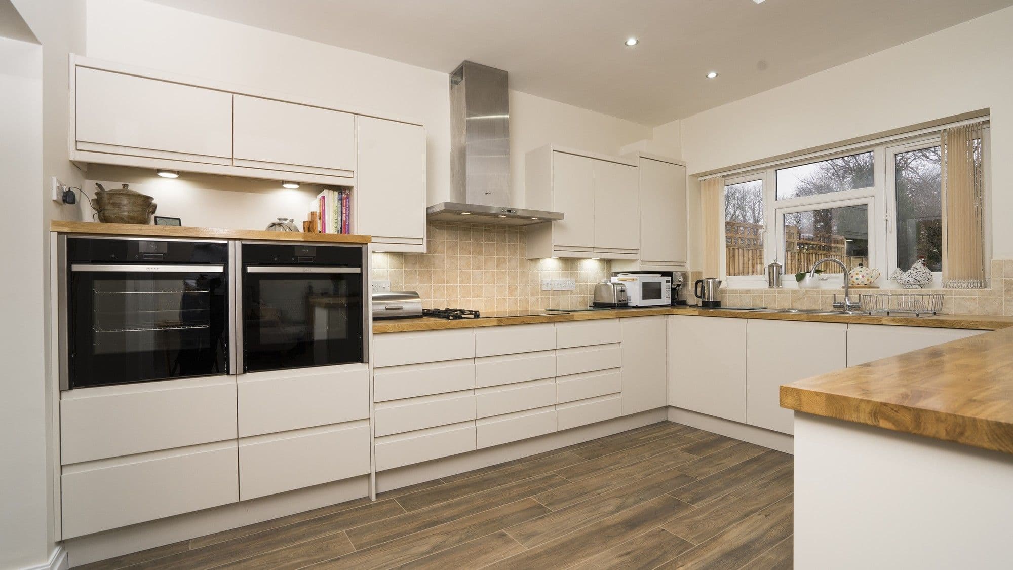 Close up of the handleless drawers used within this modern kitchen.