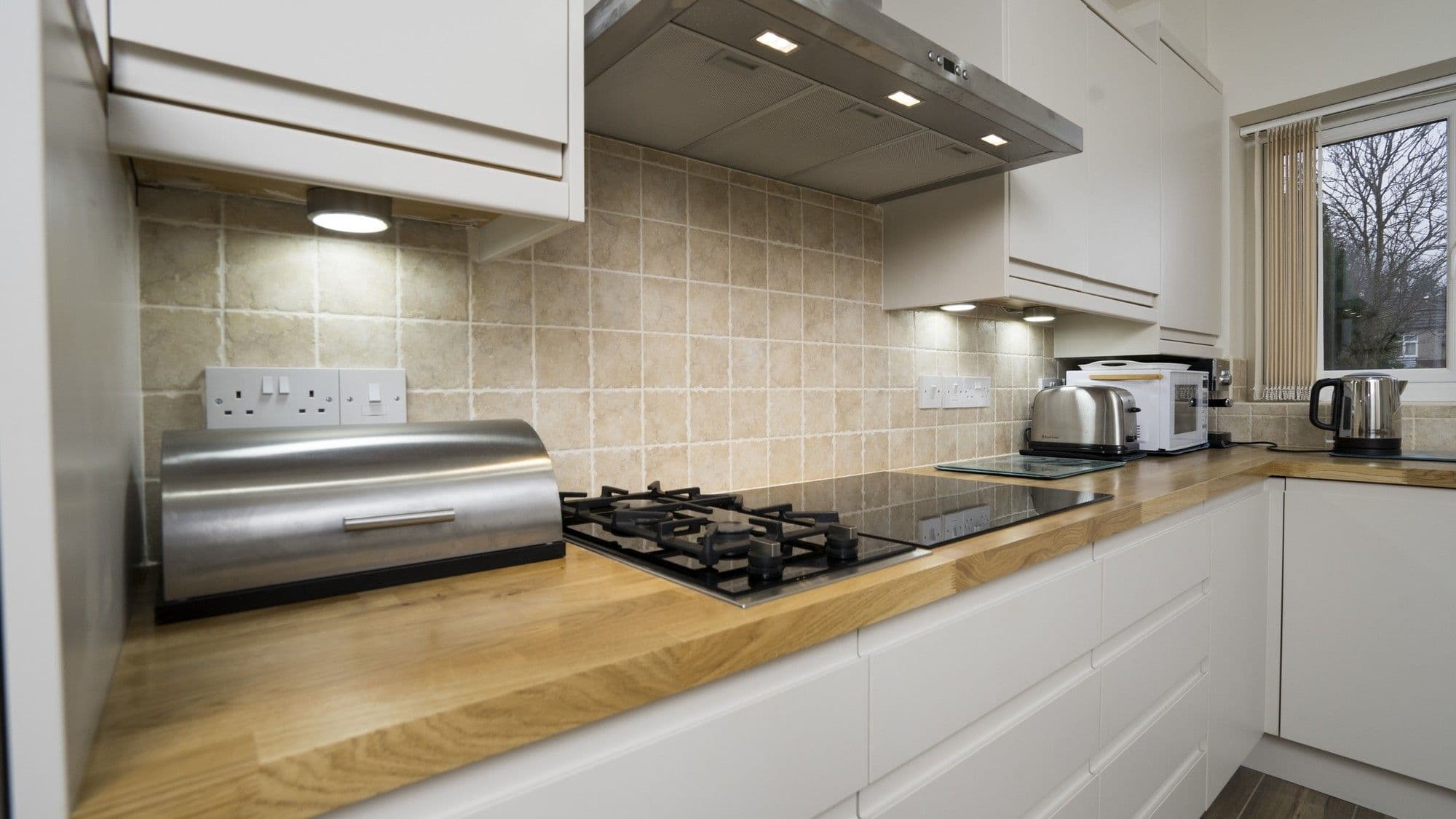 Close up of the dual hob area with gas hob and electric giving the best of both worlds for any keen cook.
