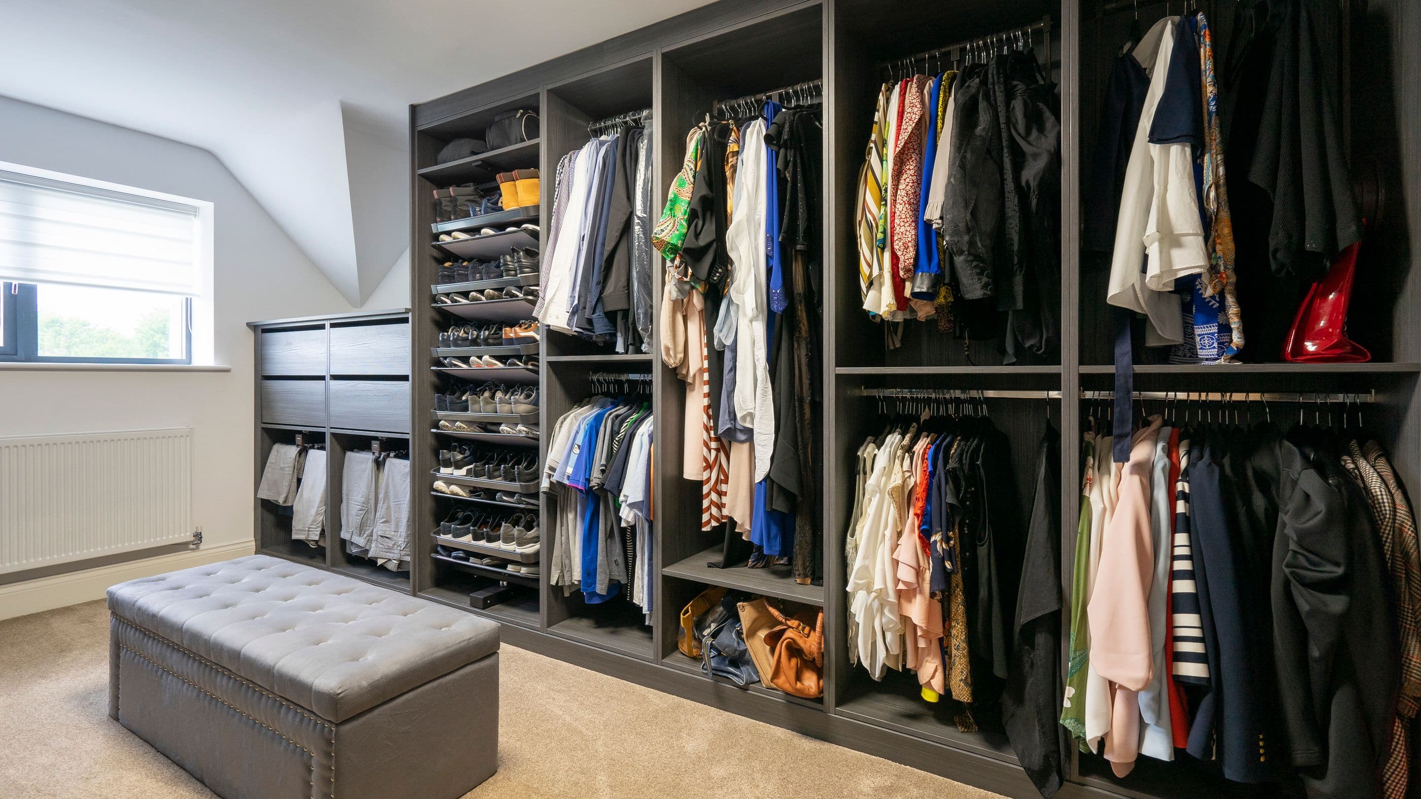 Alternative view of the pull out rotating shoe racks.