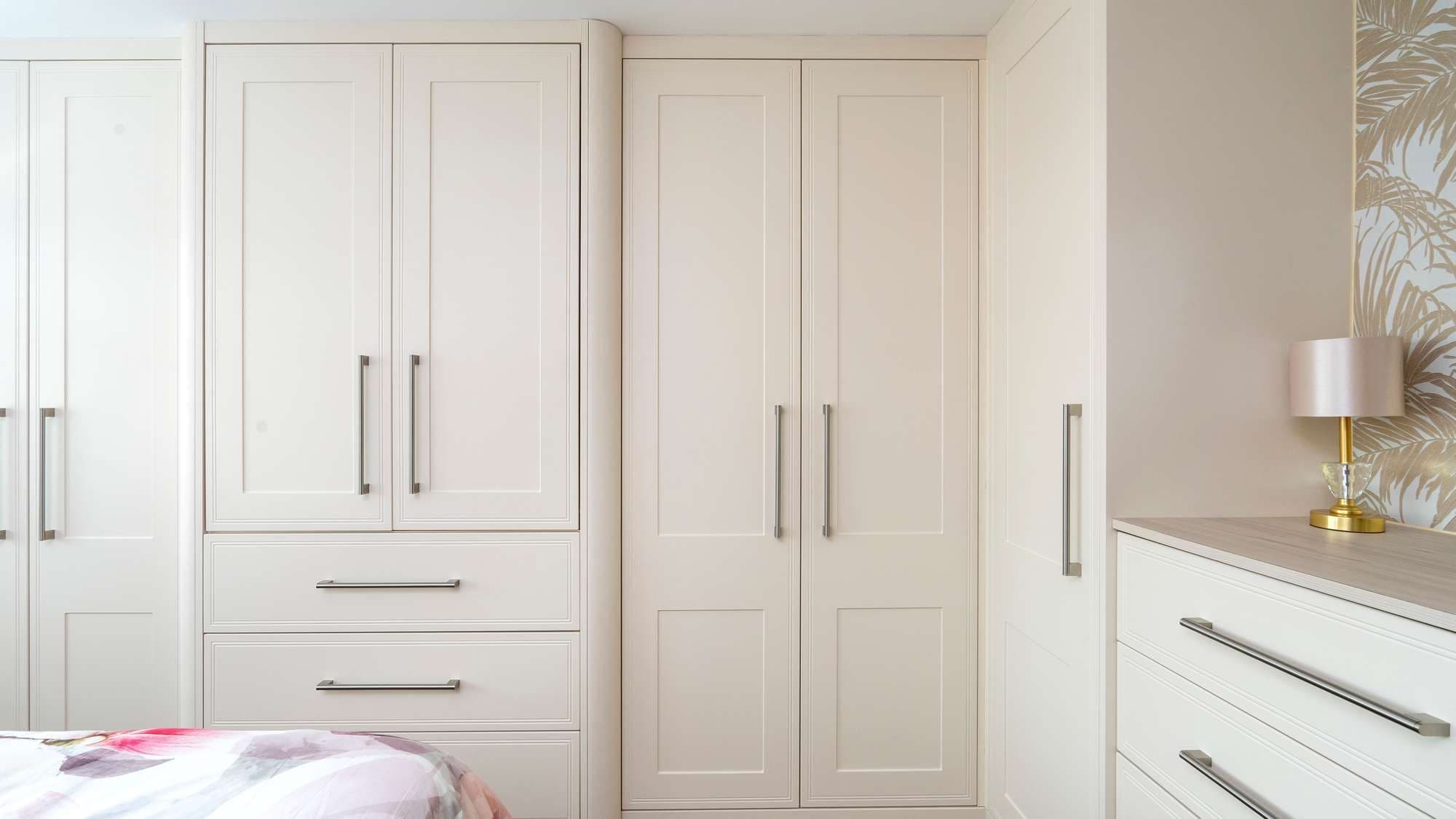 Straight on view of these shaker wardrobes in Liverpool with integrated drawers.