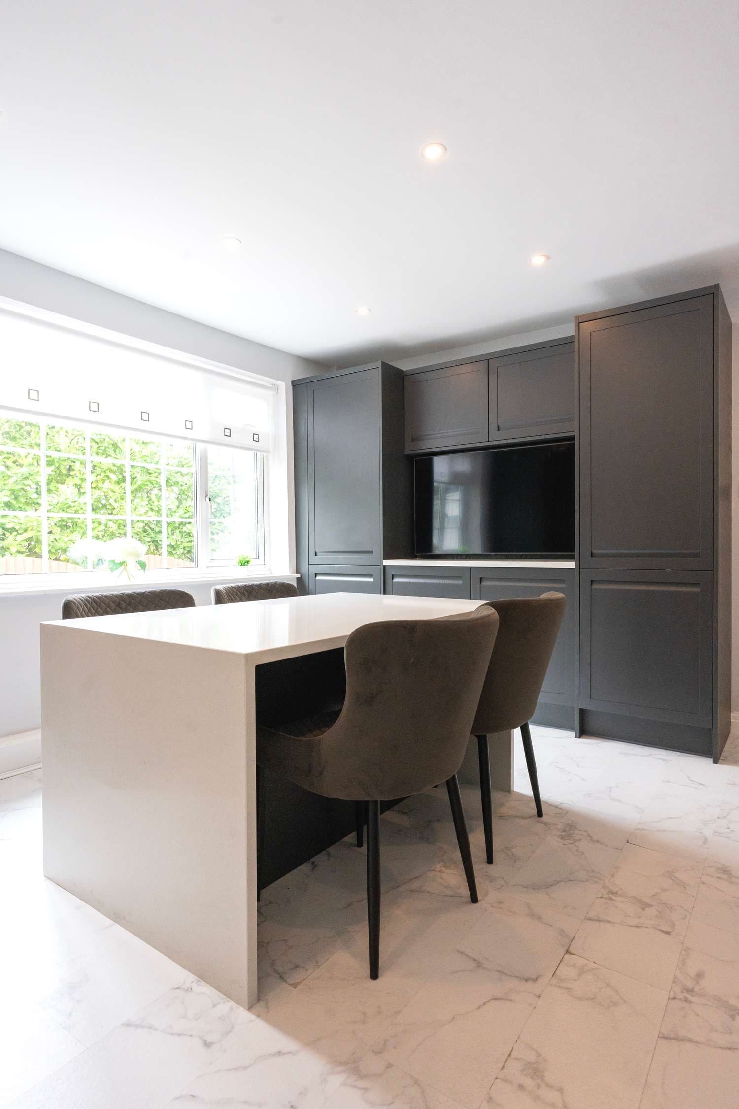 Vertical view of dining area with custom made dining table.