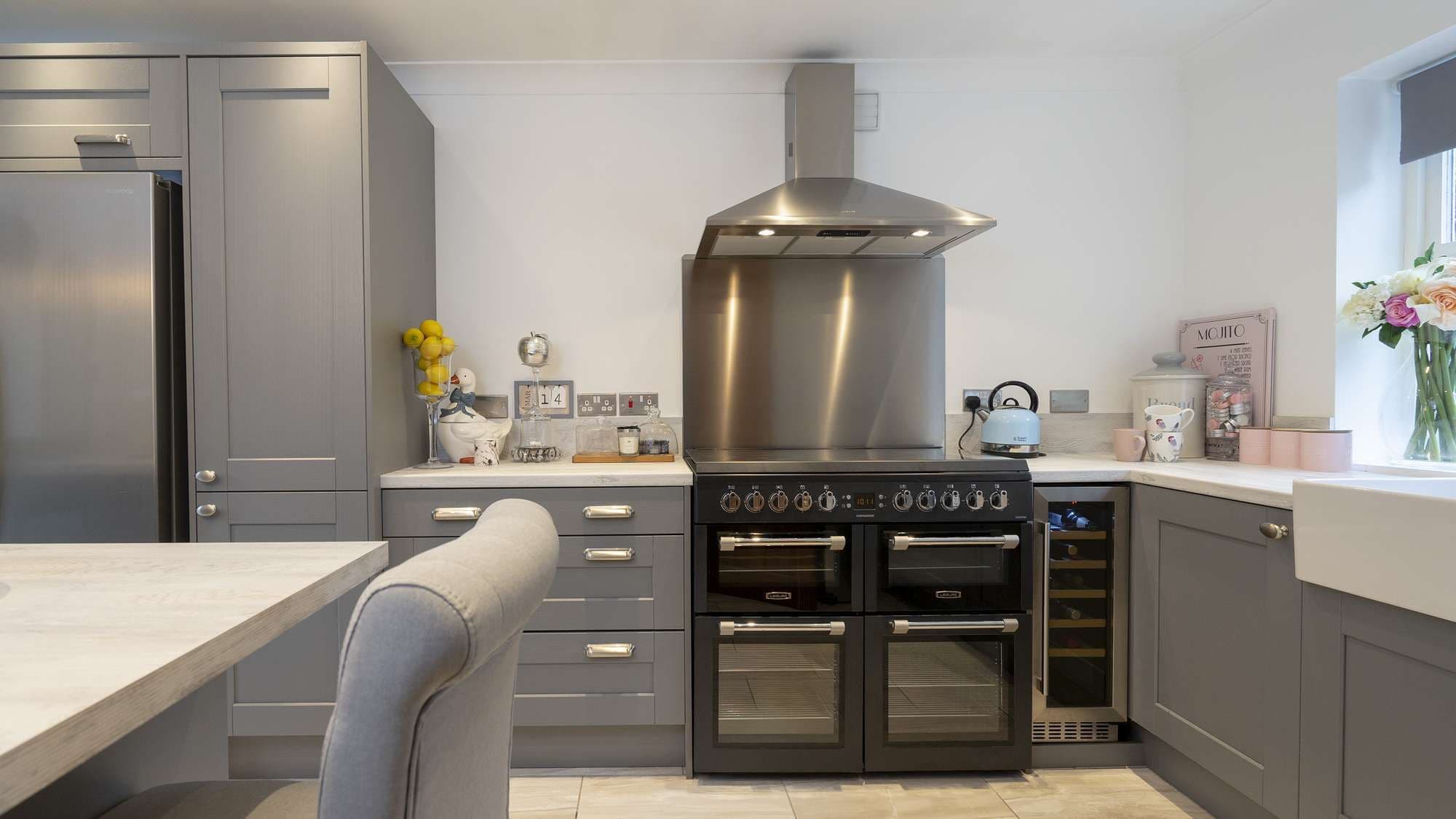 Close up of the large range cooker and stainless extractor fan.