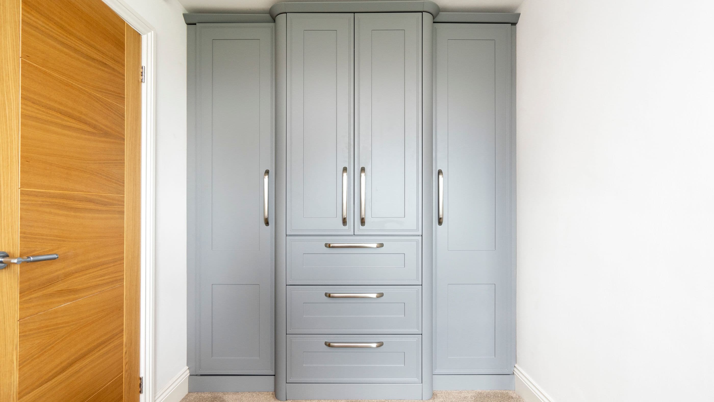 Straight on view of the grey shaker wardrobes.