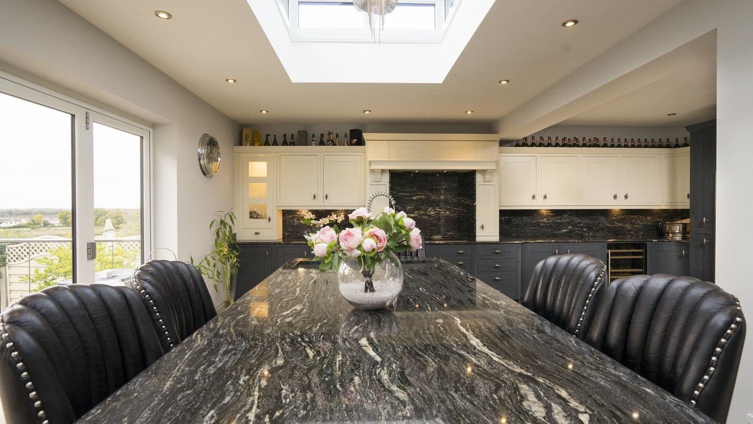 Close up of the veined black and white granite worktop, we love the detail in this worktop.