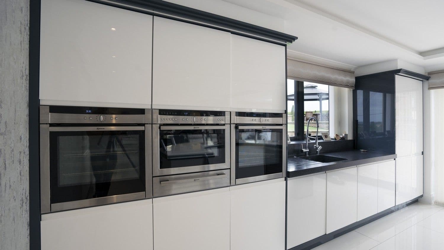 Close up of the Neff ovens, microwave and warming tray.