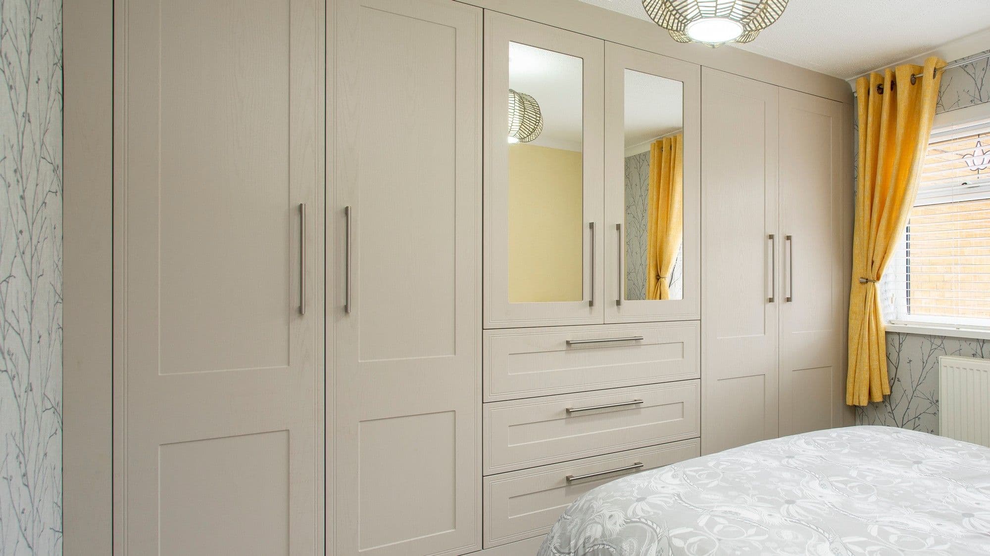 Closeup of our tullymore fitted bedroom furniture in cashmere, supplied and fitted in Crosby Liverpool.