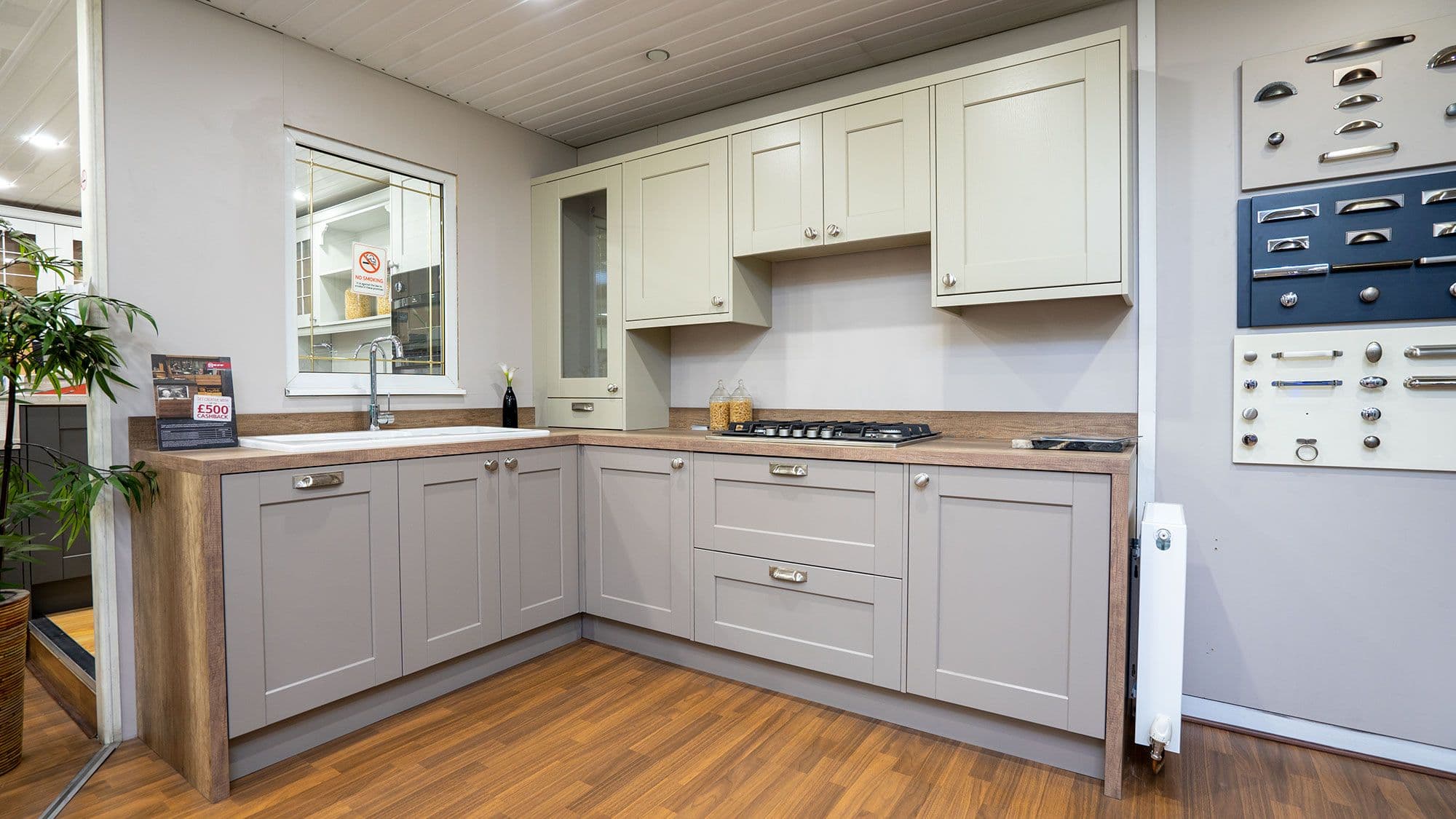 Grey shaker L-shaped display kitchen