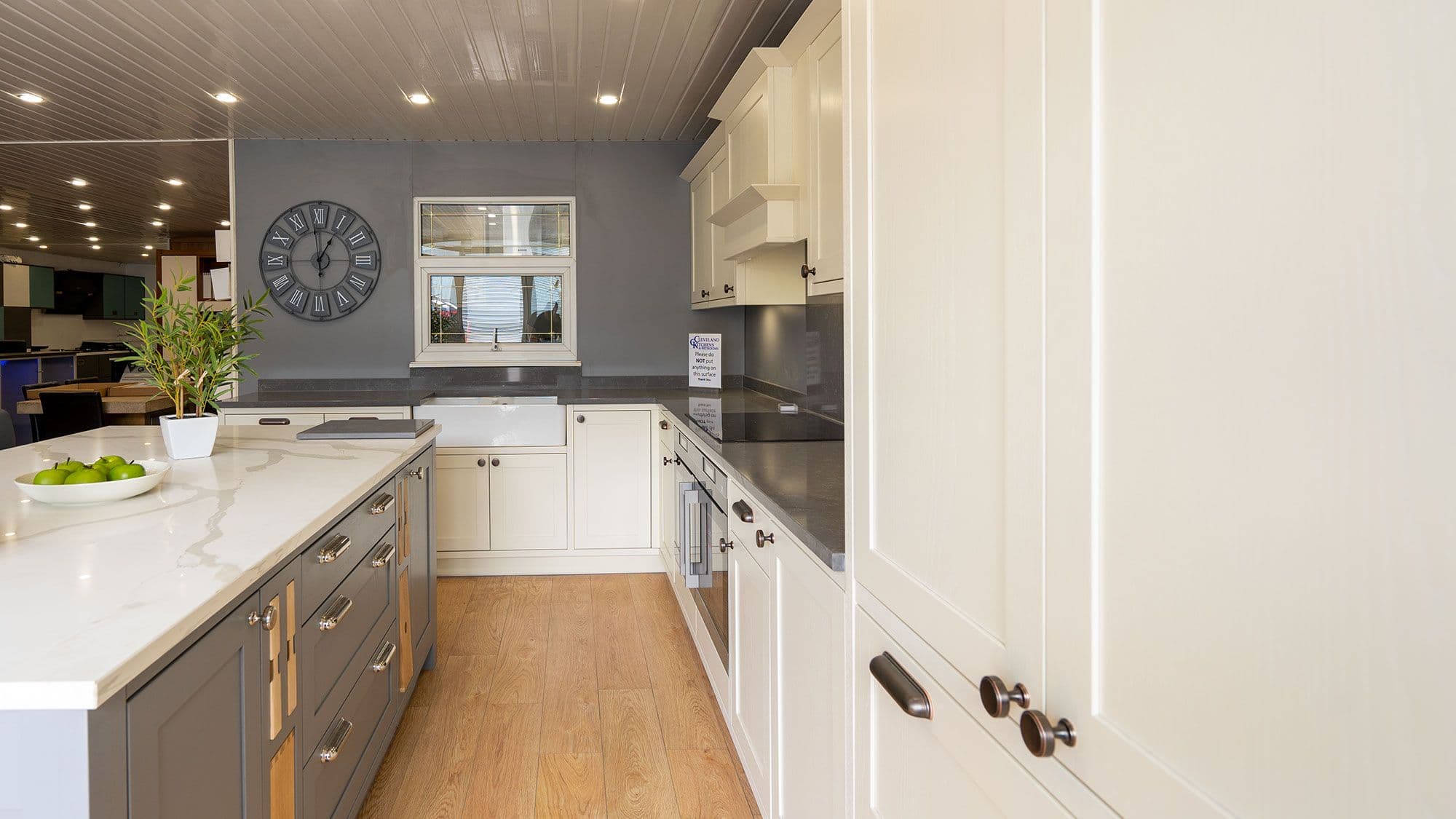 Navy shaker display kitchen with oak worktop