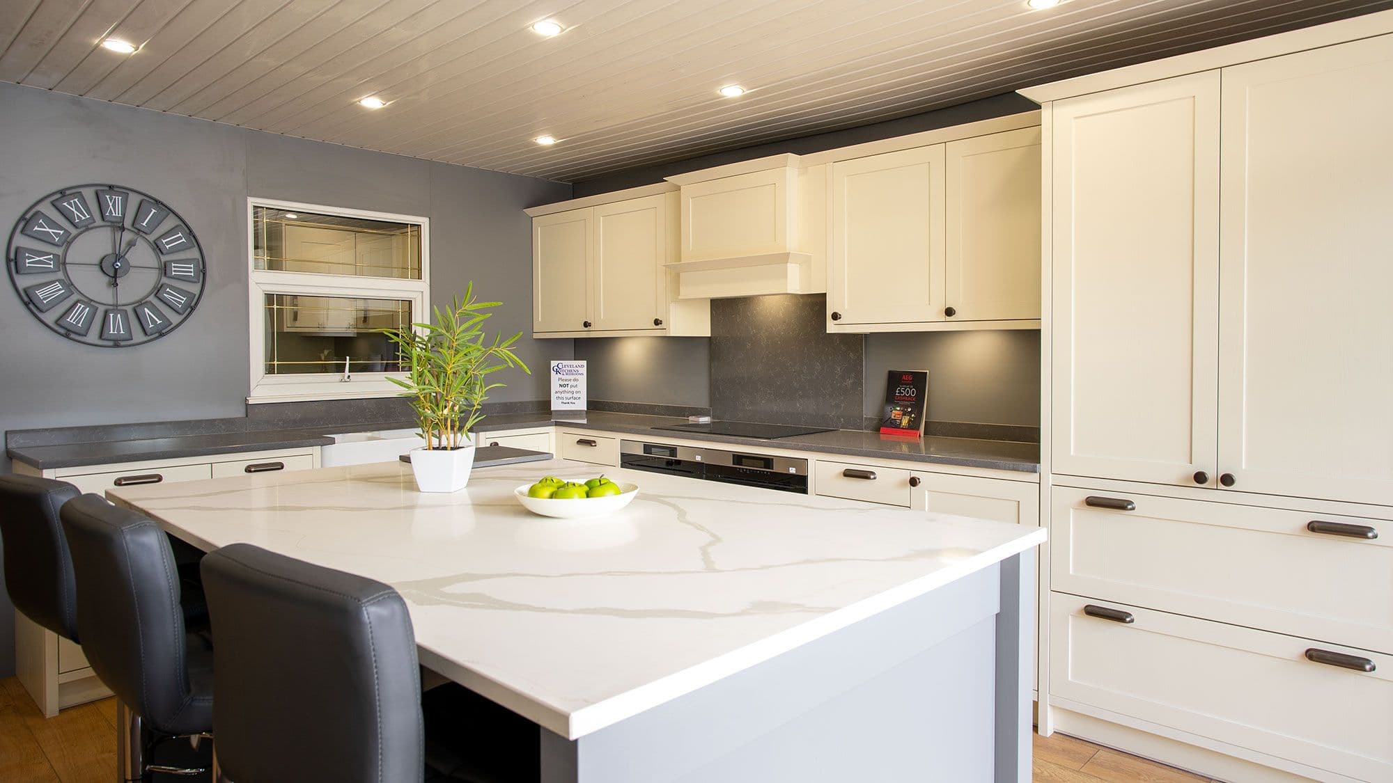 Cream shaker kitchen with large island and bar seating