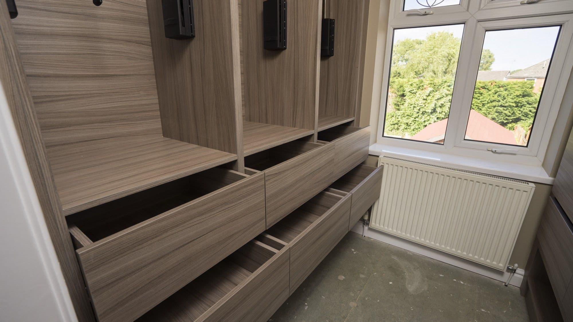 Push open drawer doors.