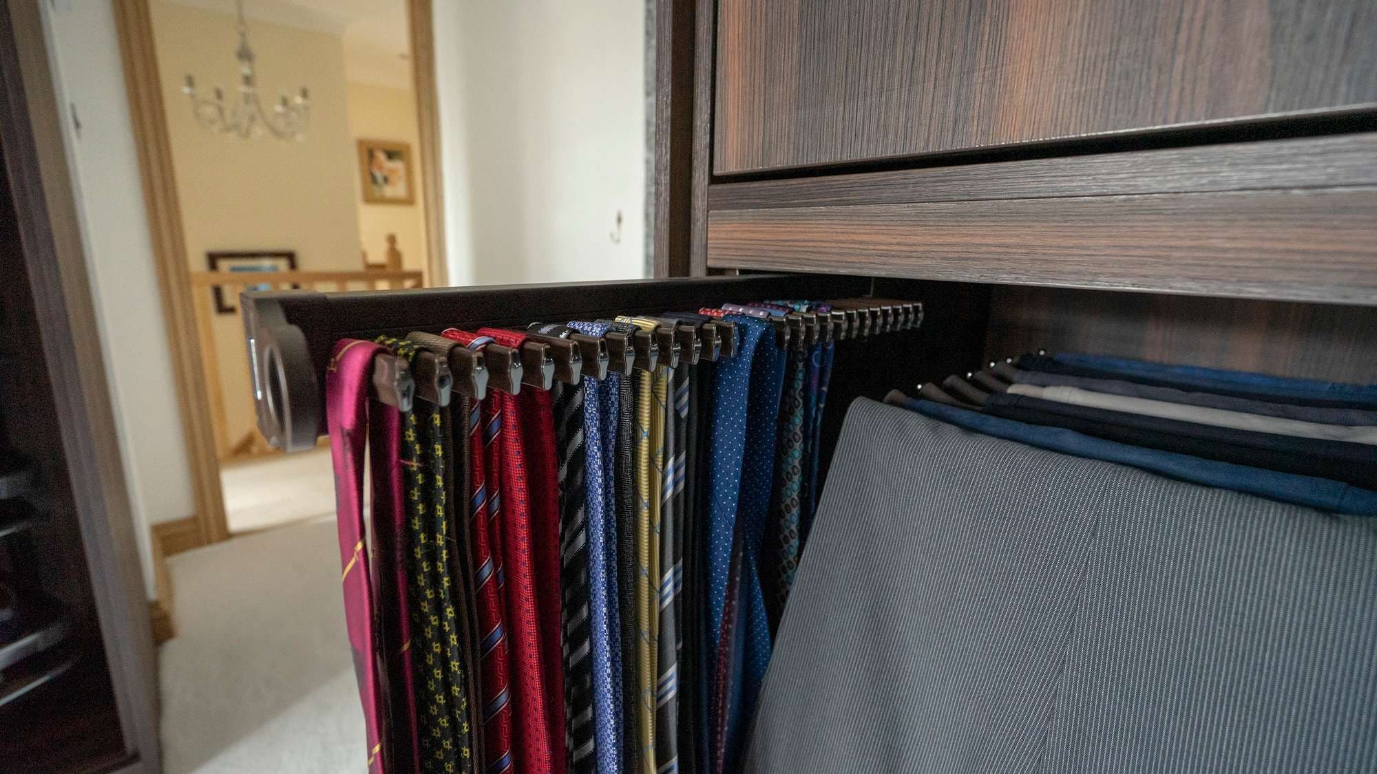 Close up shot of the pull out tie racks.