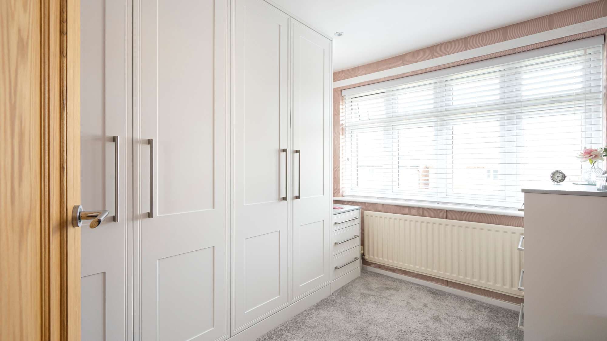 Alternative view of these shaker wardrobe in white, supplied and installed in Woolton Liverpool.