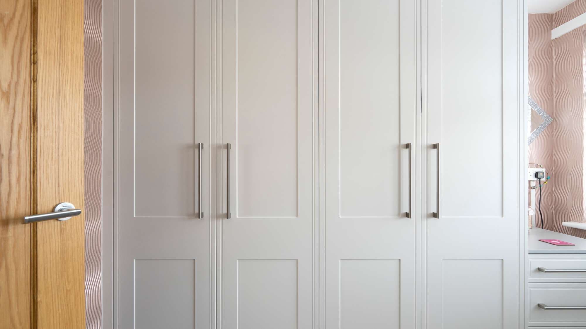 Dressing room wardrobes with matching drawers.